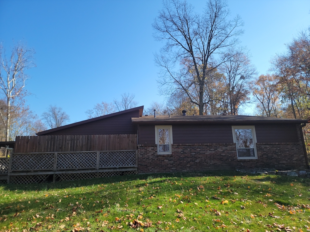 Featured Project: Side view of a Greenfield, IN home before new James Hardie siding