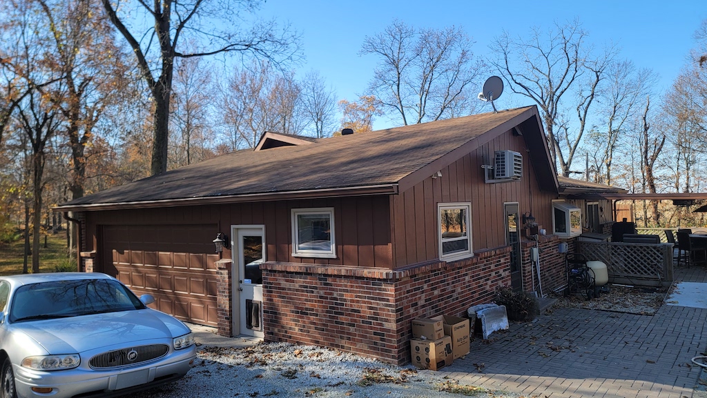 Featured Project: Back view of a Greenfield, IN home before new James Hardie siding, close up